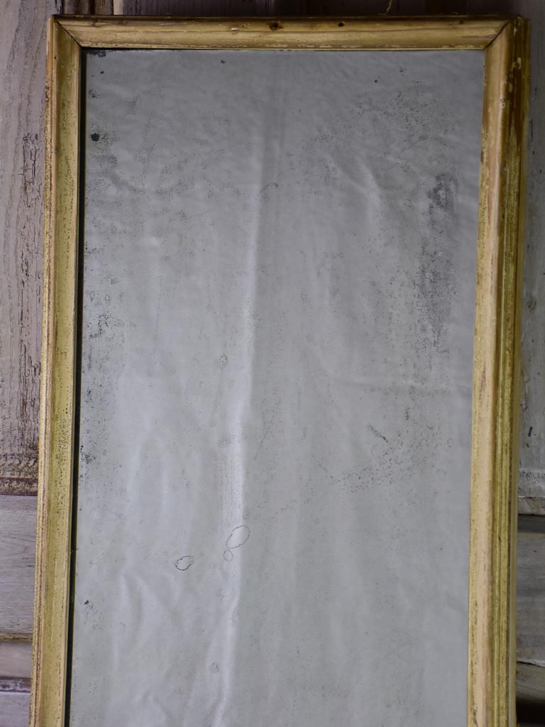 Large early 20th-century rectangular mirror with light wood frame and original glass 69¾" x 17¼"