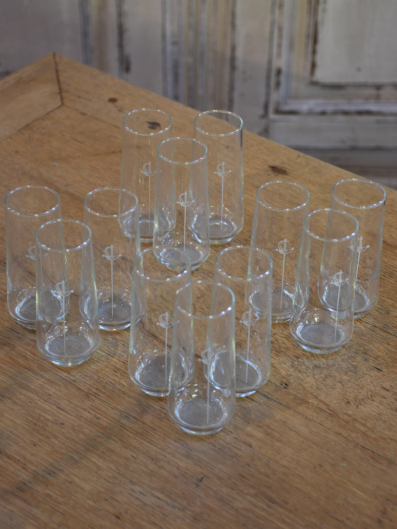 Set of 12 French Armagnac glasses with sword motif