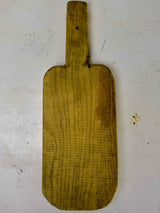 Antique French cutting board with long handle 11”
