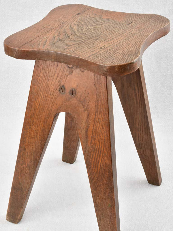 Stool with undulating seat, wooden