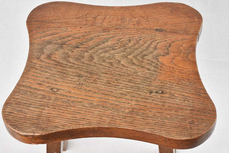 Antique wooden stool with character