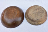 Two primitive wooden cream bowls with three spoons from Angers