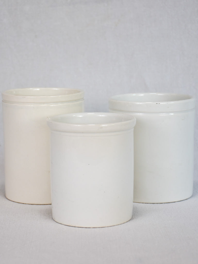Collection of 3 white ceramic preserving pots