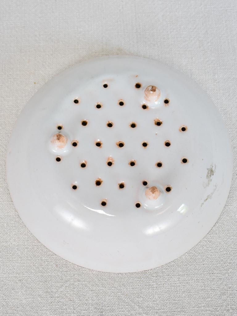 Early 20th-century French strainer plate for strawberries 8"