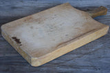 Thick antique French cutting board with rounded peaked shoulders 20¾"