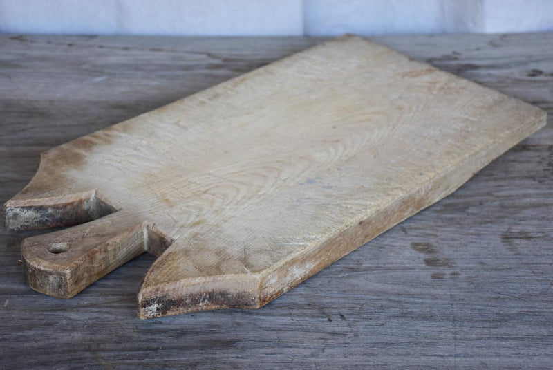 Antique French cutting board with dog ear shoulders 21¾"