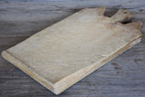 Antique French cutting board with dog ear shoulders 21¾"