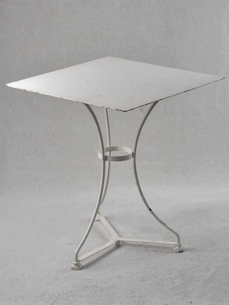 1950s style square white tables