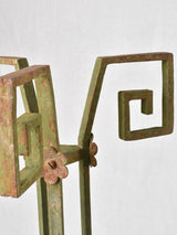 Green rusted stand with classic design
