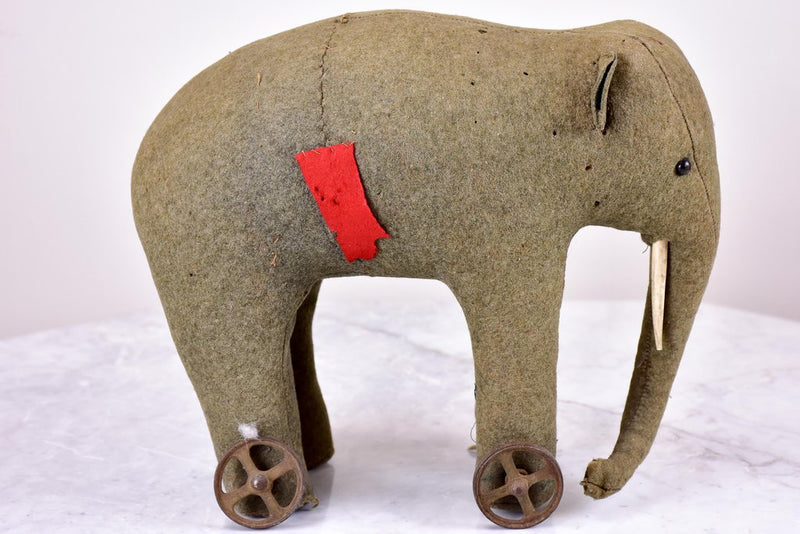 Three antique French toy elephants