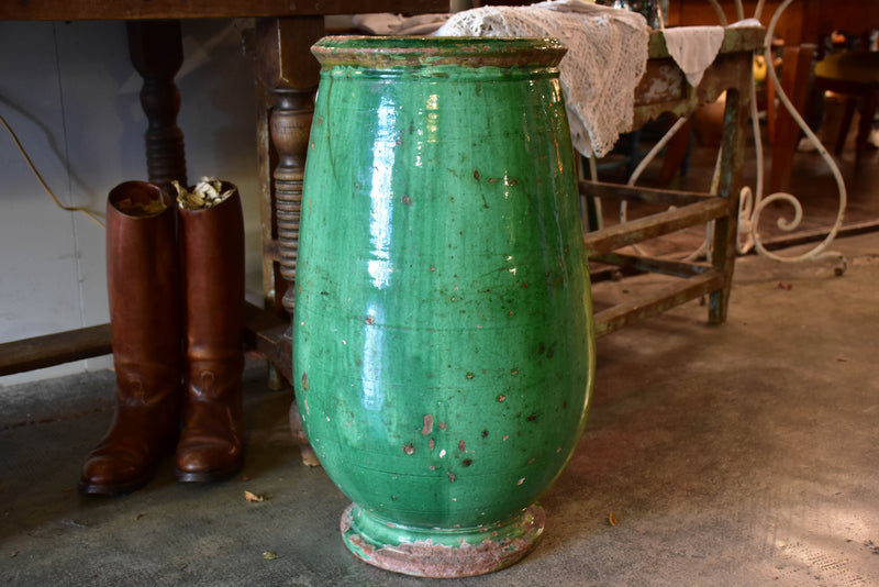 Tall French olive jar with green glaze