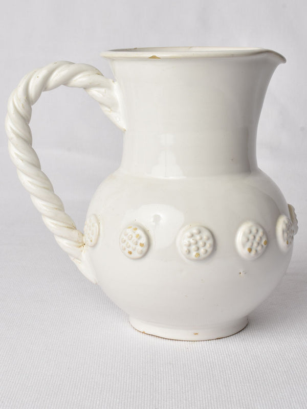 1960s white relief decorated ceramist jug