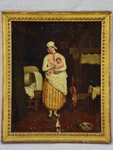 Gilded framed breastfeeding artwork