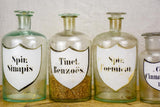 Collection of six 19th Century pharmacy jars - labelled with lids