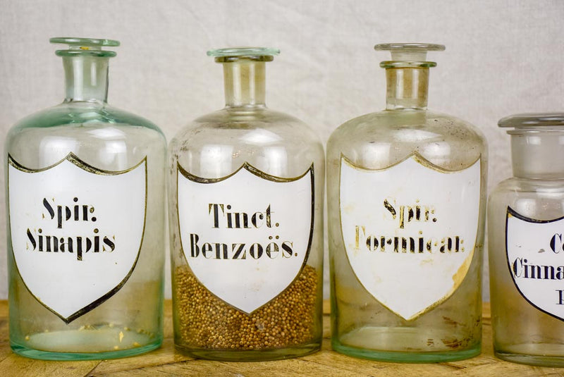 Collection of six 19th Century pharmacy jars - labelled with lids