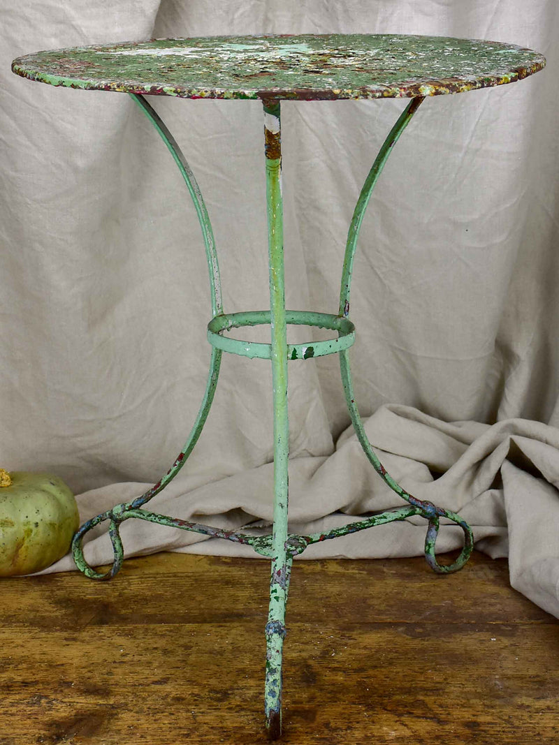 Antique French garden table with green patina