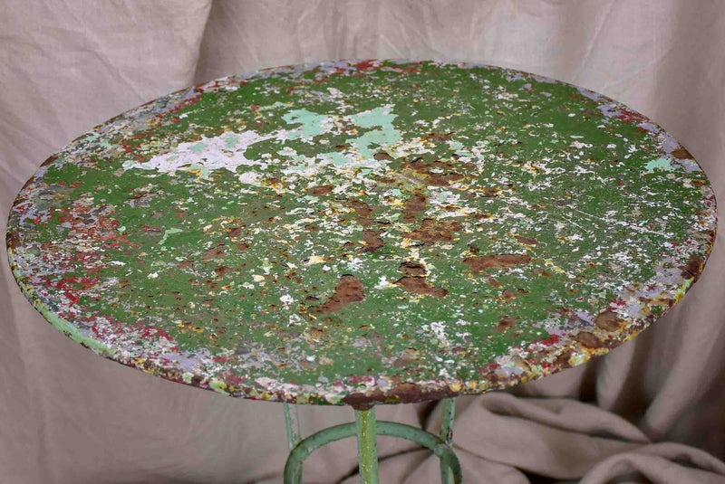 Antique French garden table with green patina