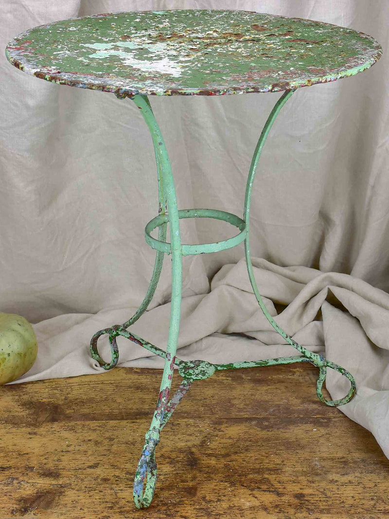 Antique French garden table with green patina