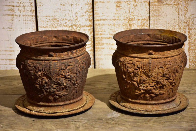 Pair of antique French cast iron planters / pot stands