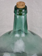 Small antique French demijohn bottle