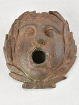SALVAGED FOUNTAIN SPOUT COVER - CAST IRON MASQUERADE 9¾"