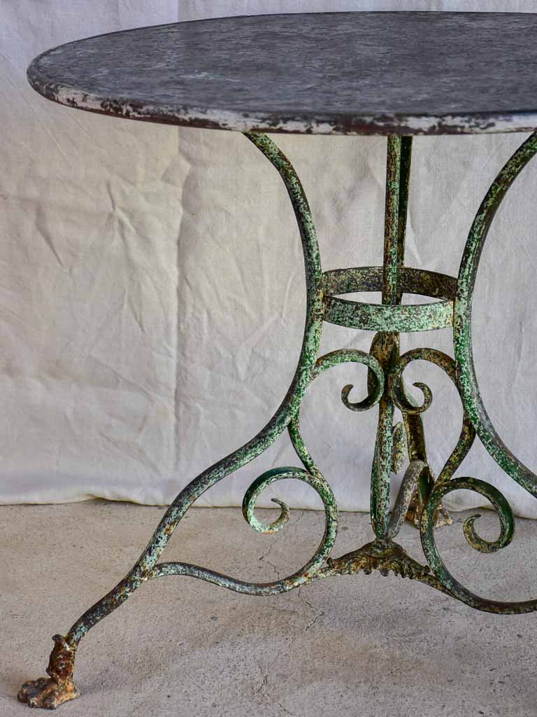 Late 19th Century round Arras garden table with claw feet 32"