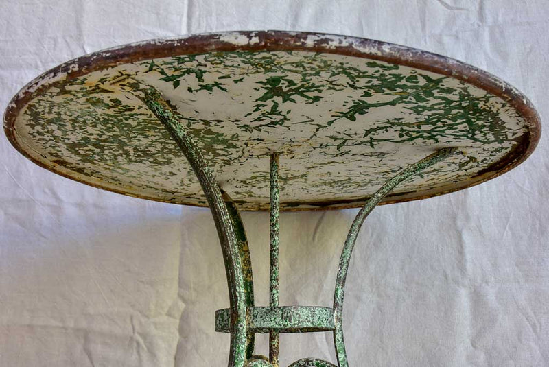 Late 19th Century round Arras garden table with claw feet 32"
