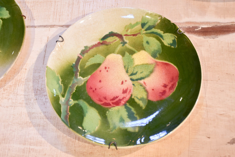 Three antique Gien plates with fruit