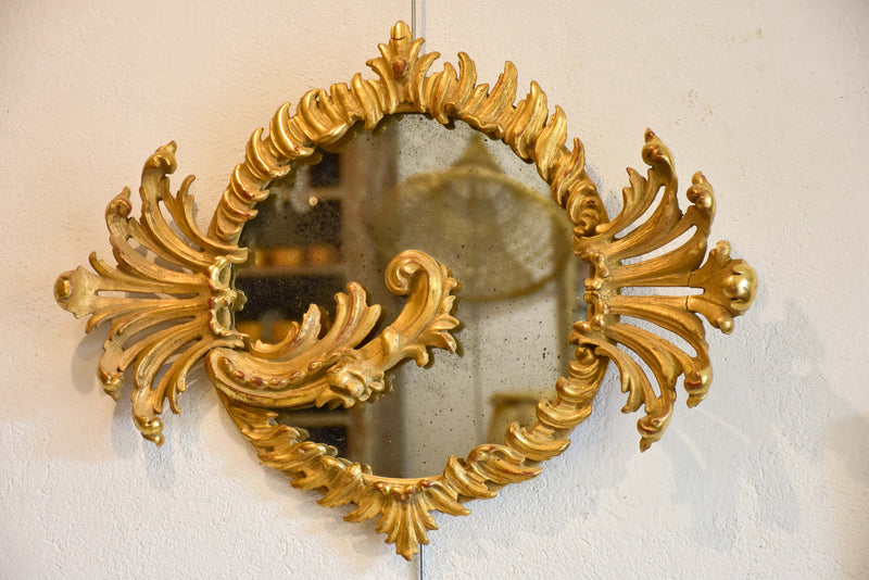 Decorative round Louis XV mirror with gilt wood frame