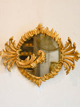 Decorative round Louis XV mirror with gilt wood frame