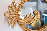 Decorative round Louis XV mirror with gilt wood frame