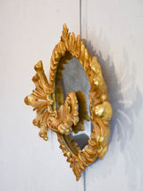 Decorative round Louis XV mirror with gilt wood frame