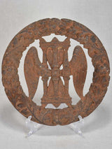 Late 19th-century cast iron eternity wreath with hourglass and wings 10¼"