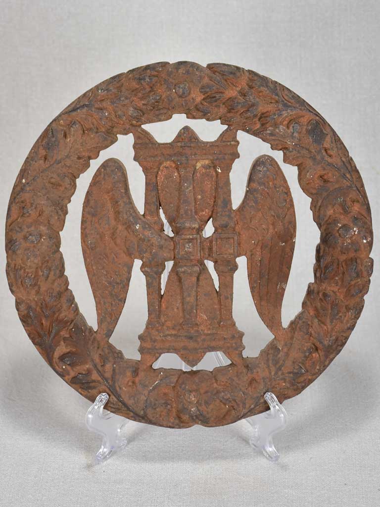 Late 19th-century cast iron eternity wreath with hourglass and wings 10¼"