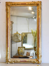 Gilded Napoleon III mirror with sculptural frame