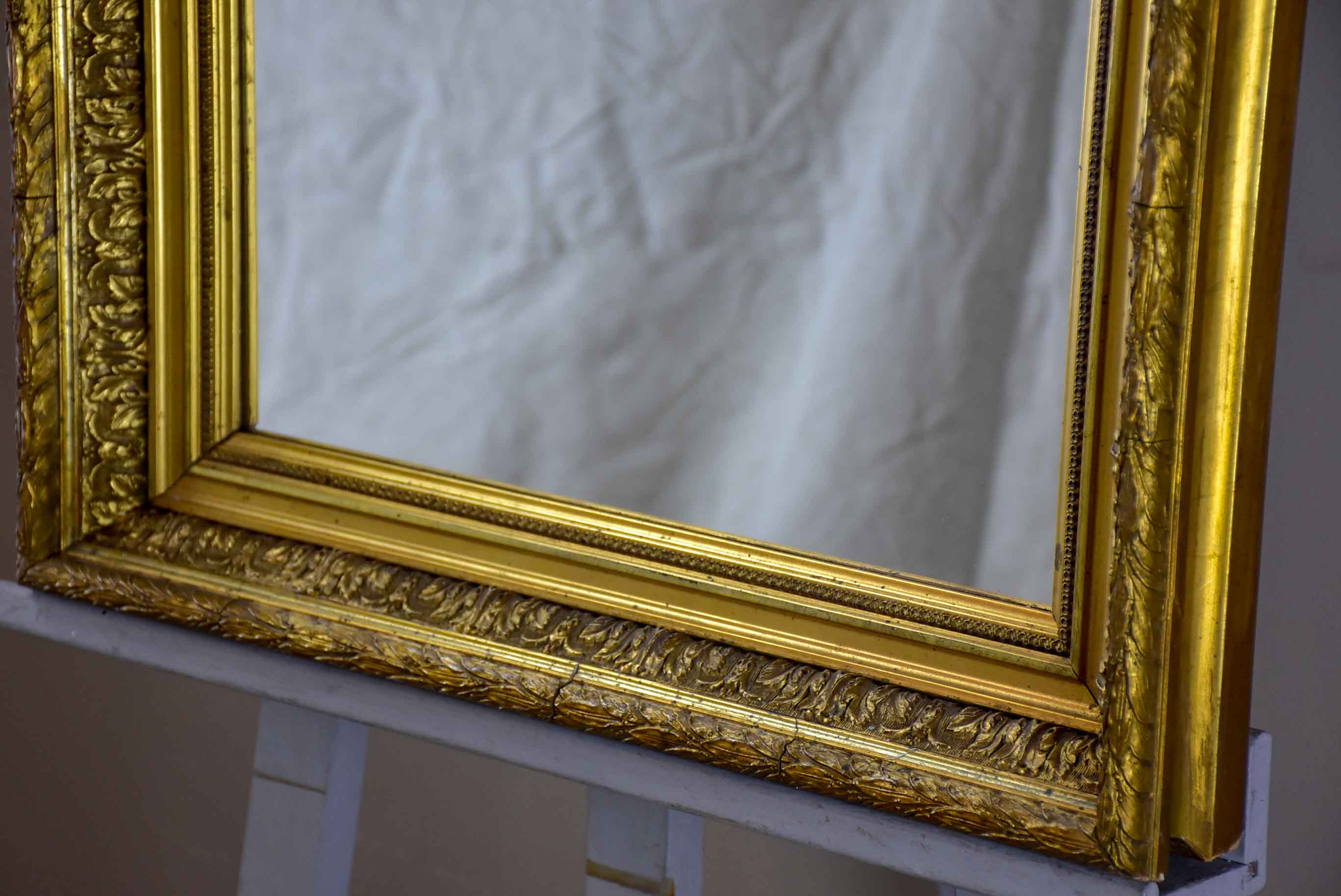 Late 19th Century rectangular mirror with gilded frame