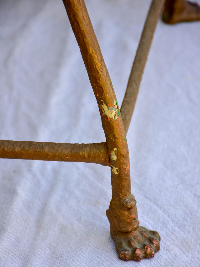 19th century French iron garden chair from Arras with lions claw feet