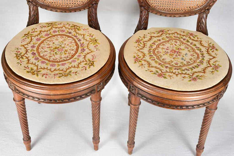 Louis XVI-style armchairs with cross-stitch upholstery