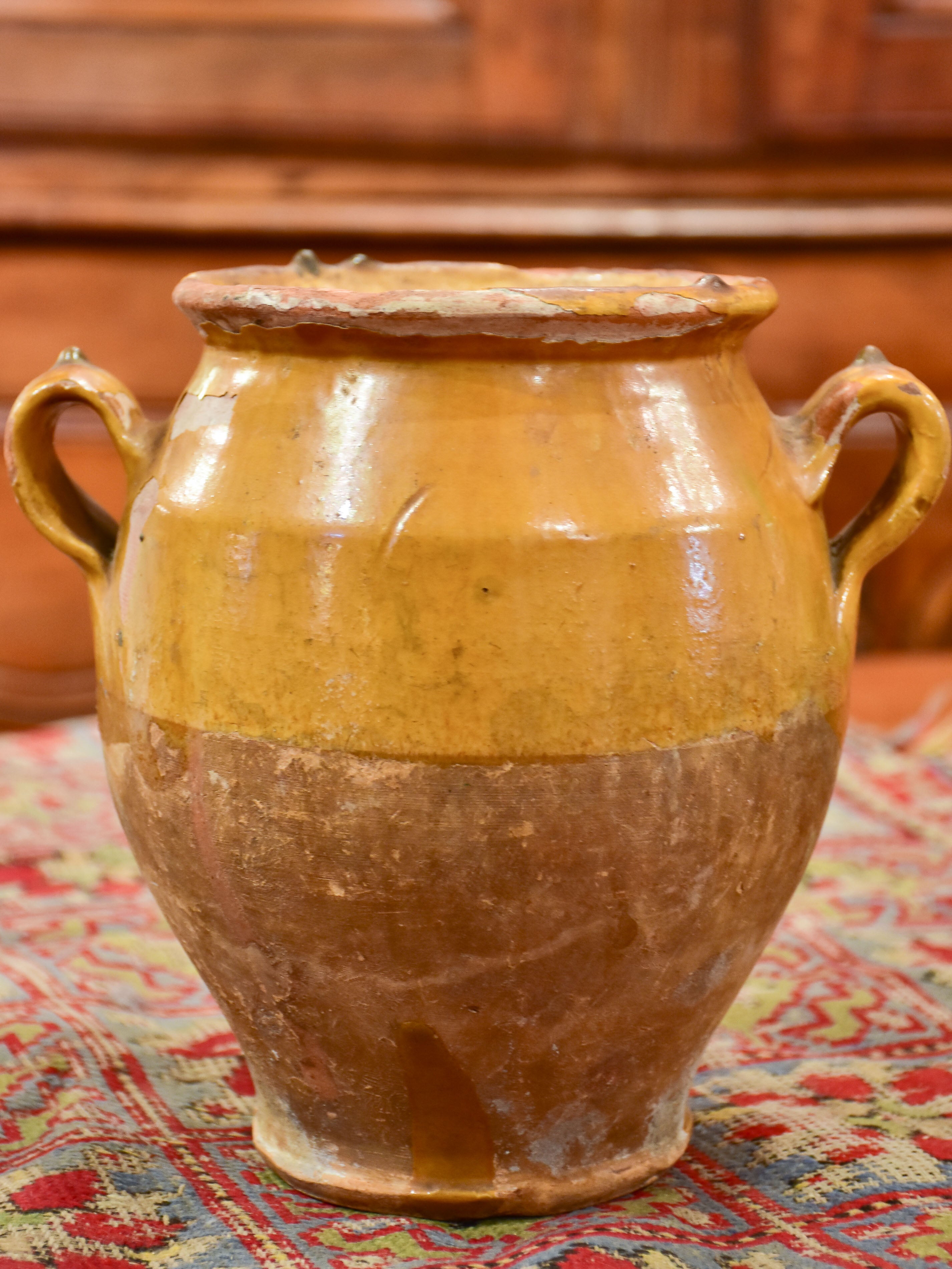 19th century French confit pot with orange glaze