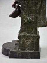 Early twentieth century metal sculpture of a lady at a fountain 30¼"