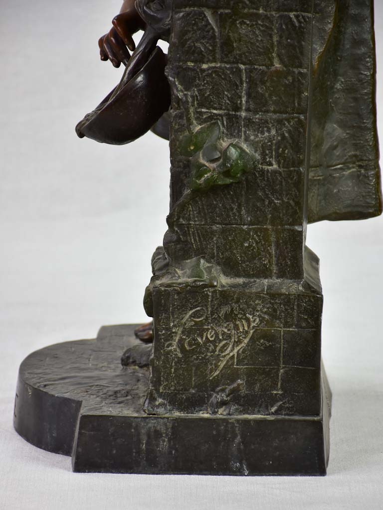 Early twentieth century metal sculpture of a lady at a fountain 30¼"