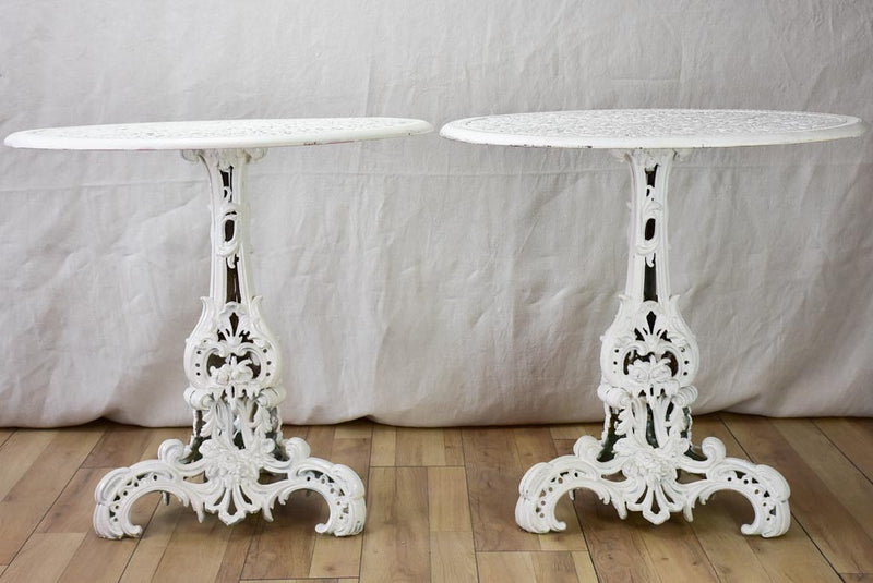 Pair of white English cast-iron garden tables
