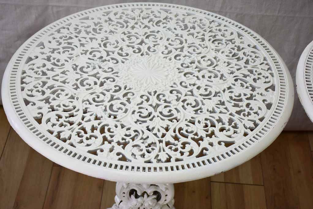 Pair of white English cast-iron garden tables