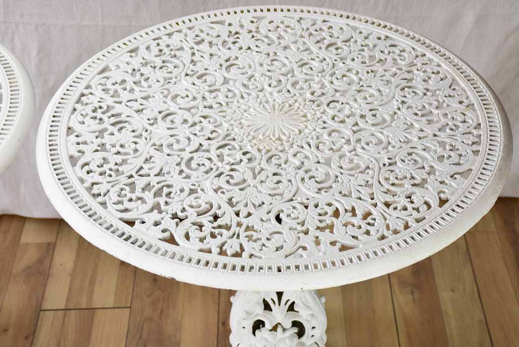 Pair of white English cast-iron garden tables