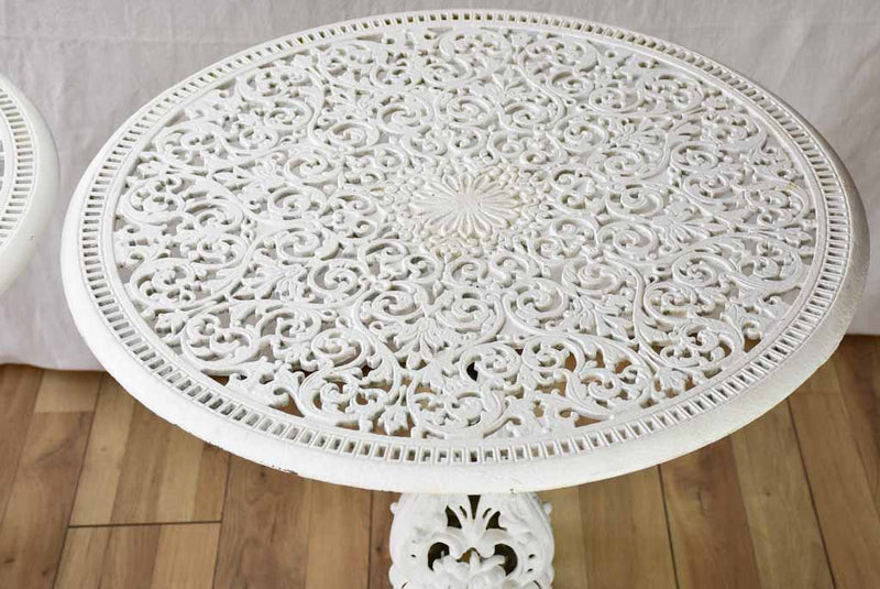 Pair of white English cast-iron garden tables