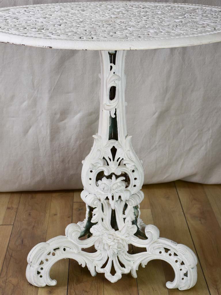 Pair of white English cast-iron garden tables