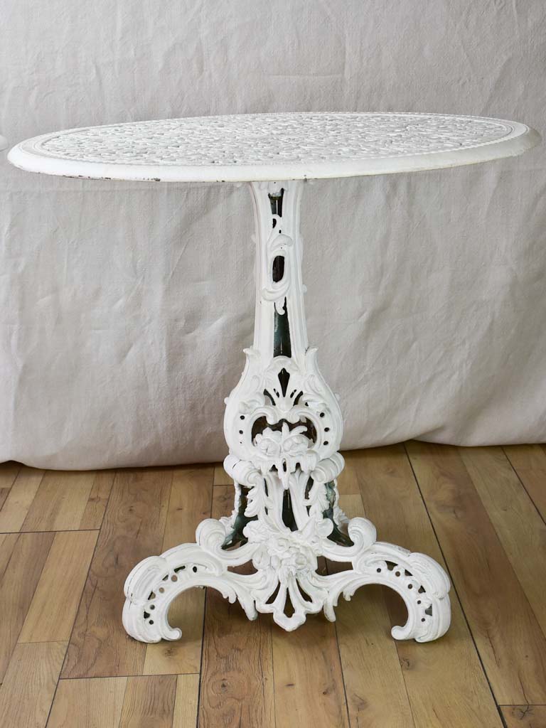 Pair of white English cast-iron garden tables