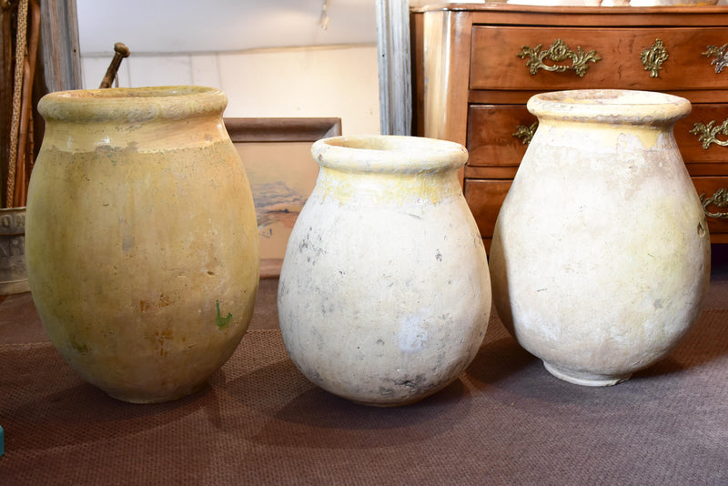 Collection of three antique biot jars