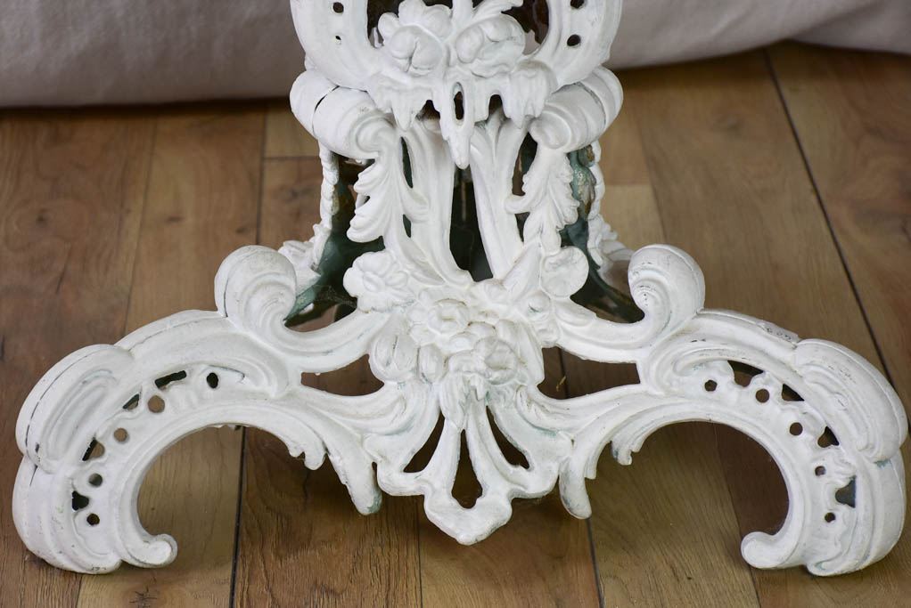 Pair of white English cast-iron garden tables