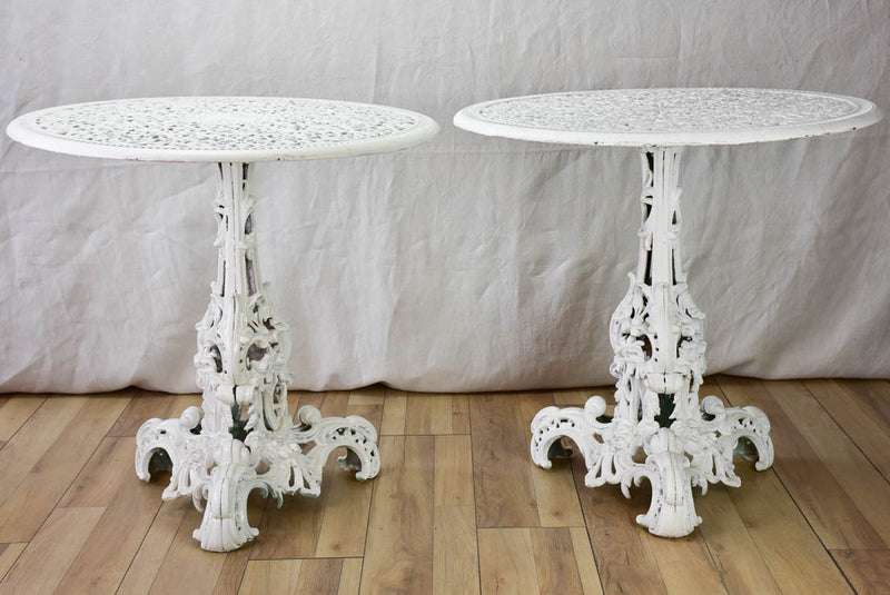 Pair of white English cast-iron garden tables